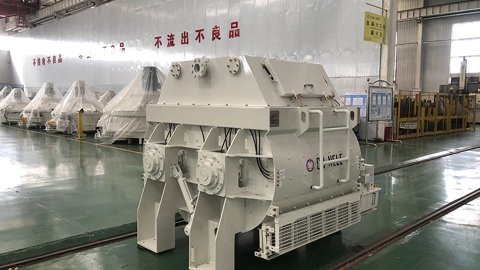 What are the functions of the shaft end seal of a twin-shaft mixer?